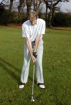 At the address position, you must concentrate on holding the arms so that the elbows remain as close together as  is physically possible. -- This  forces  the arms  to be totally passive to the movements of the shoulders. 